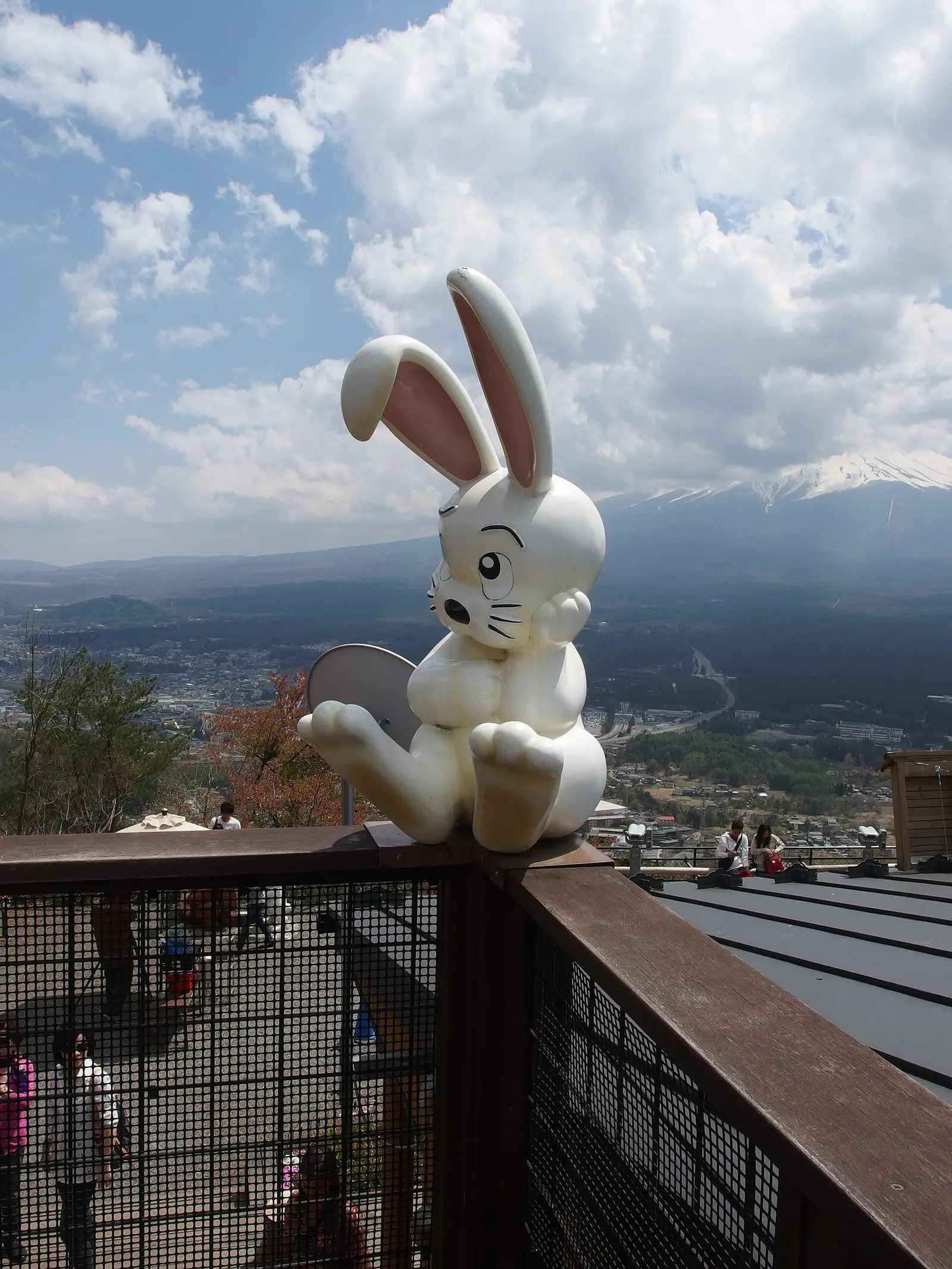 Rabbit statue on the Mt Tenjo summit deck, Mt Fuji behind cloud