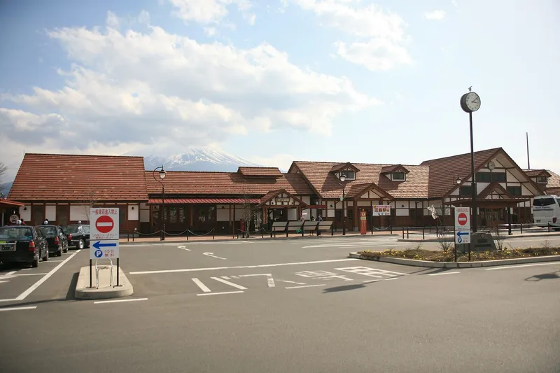 Kawaguchiko Station front with the peak of Mt Fuji behind the roof
