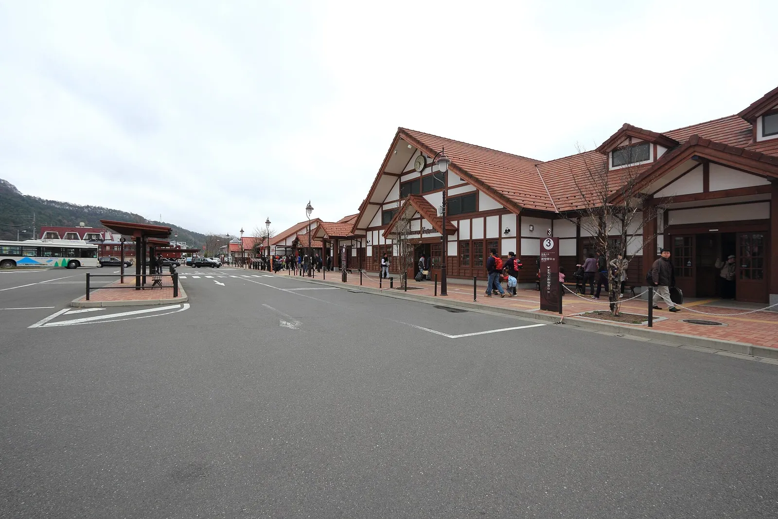 Kawaguchiko Station and bus bays on a grey day