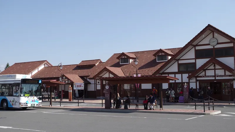 Kawaguchiko Station front with a bus stop and local bus