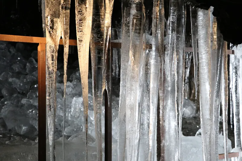 Long icicles hanging inside Narusawa Ice Cave