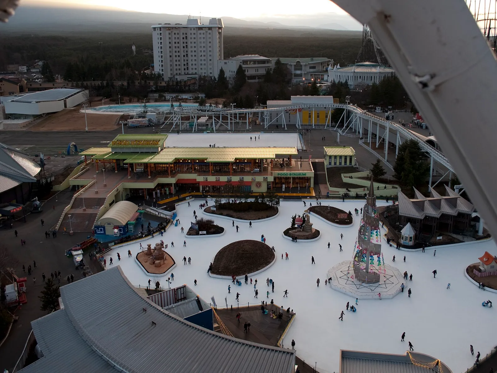 Fuji-Q Highland seen from above: food hall, ice rink and roller coaster track
